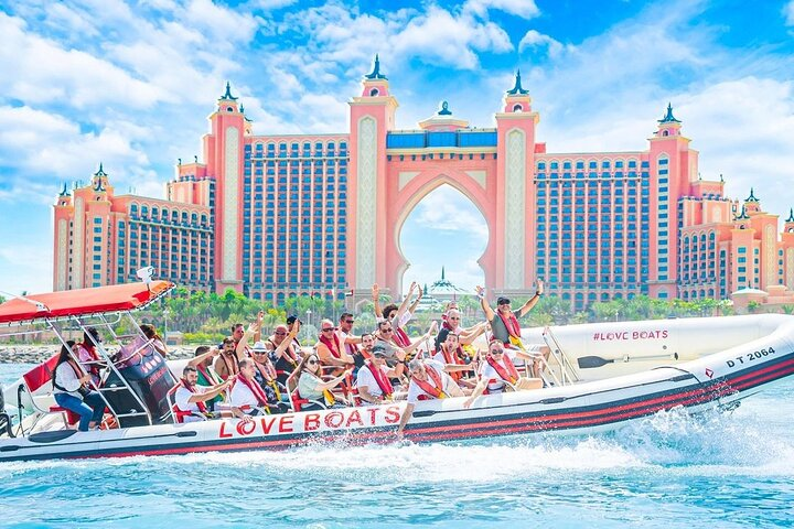 Experience the thrill of cruising through Dubai's stunning waterways with breathtaking views of luxury landmarks like Atlantis The Palm and Dubai Marina that create unforgettable memories.